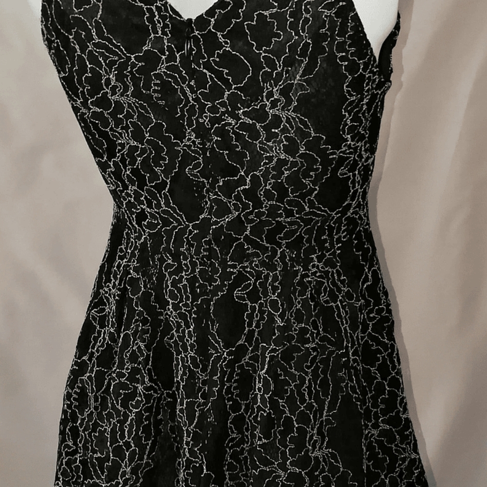 Dolce & Gabbana-style elegant dress. Quite flattering.